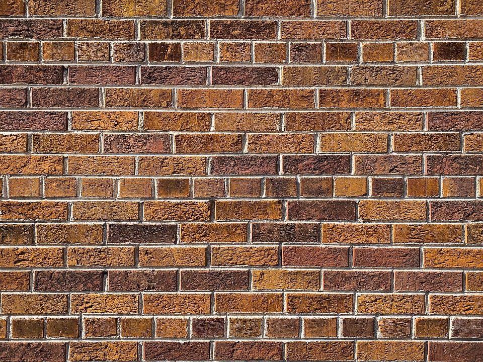a damp stone wall